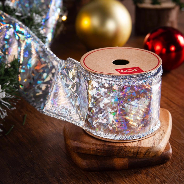 Cinta Navideña JOY Plateada Tornasolada 6.3 cm Cinta Navideña JOY Plateada Tornasolada 6.3 cm